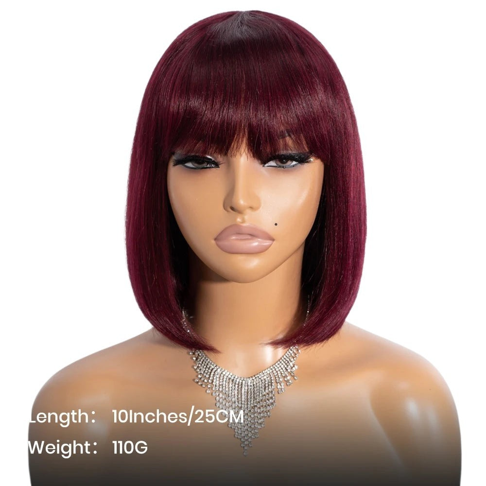 RitzWigs burgundy straight human hair bob wig with bangs on a mannequin head