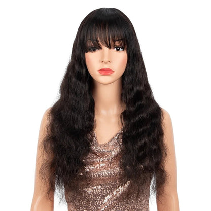 RitzWigs natural black body wave human hair wig with bangs on a mannequin, featuring long wavy Remy Peruvian hair.