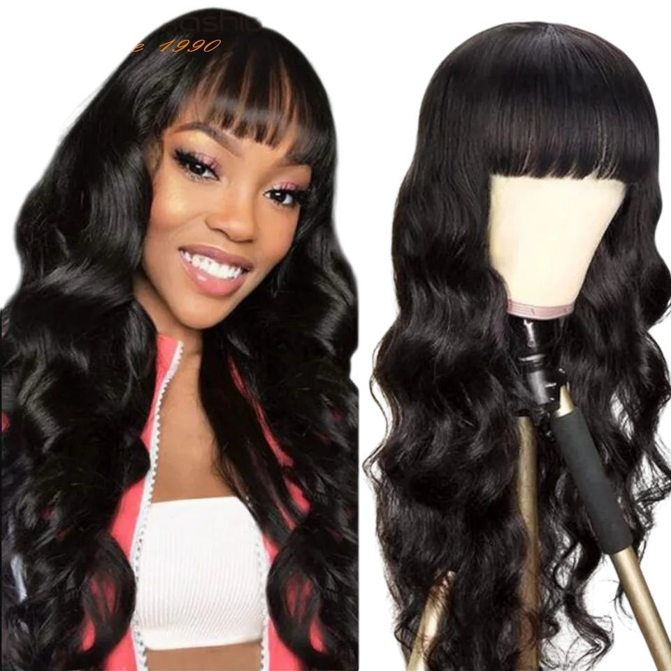RitzWigs natural black body wave human hair wig with bangs worn by a smiling woman and displayed on a mannequin head