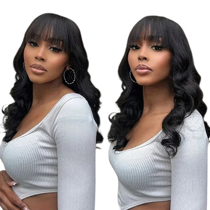 RitzWigs natural black body wave human hair wig with bangs worn by a model in a casual setting