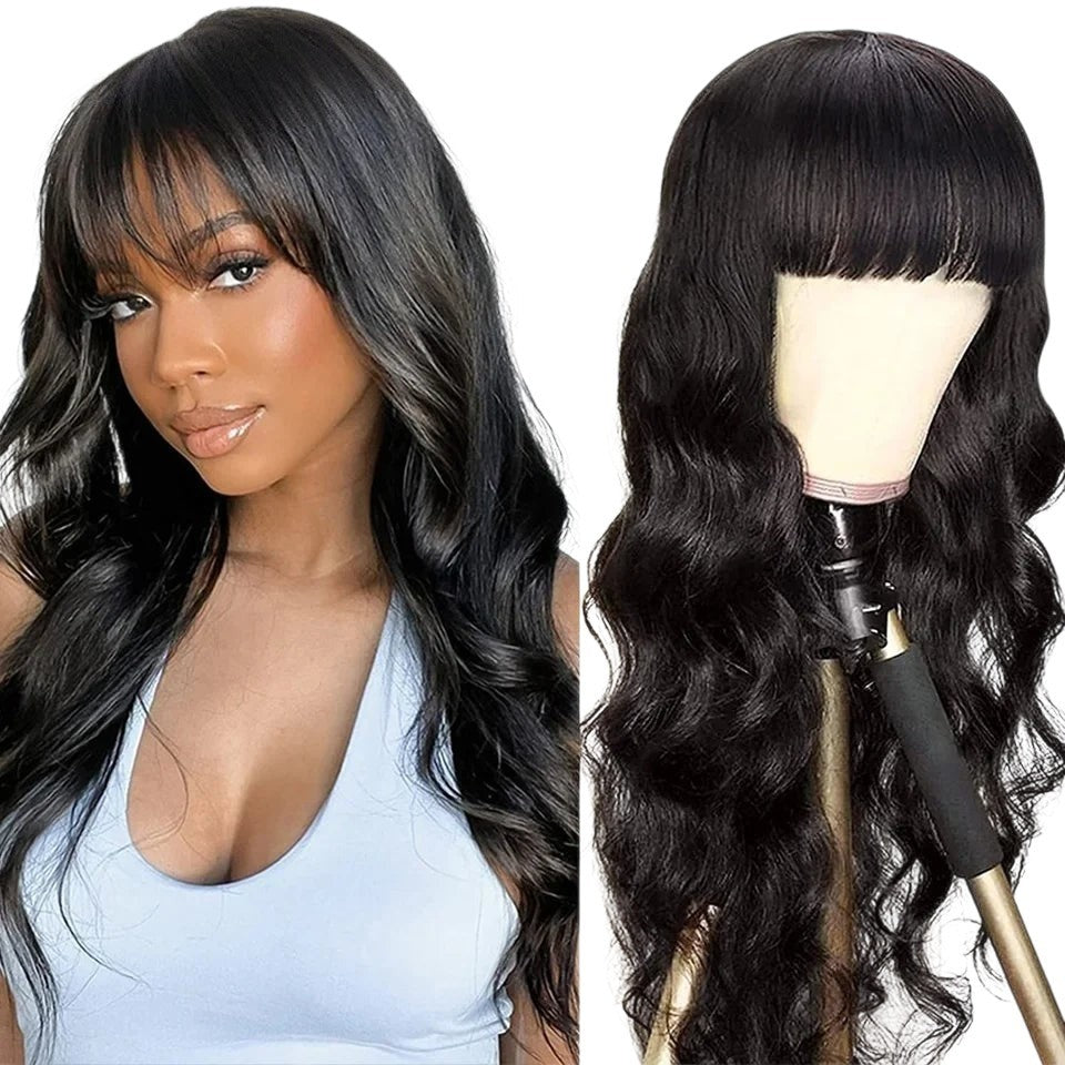 RitzWigs natural black body wave human hair wig with bangs worn by a model and displayed on a mannequin head