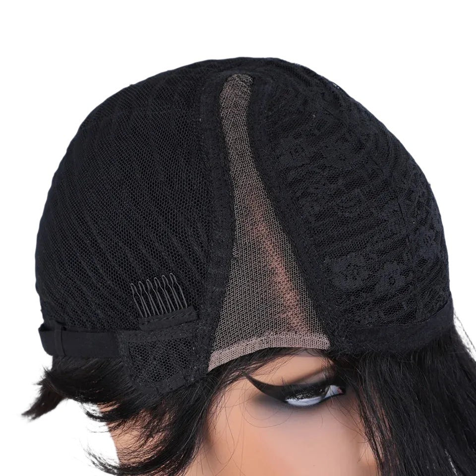RitzWigs black pixie cut human hair wig showing the interior construction with transparent Swiss lace and side combs