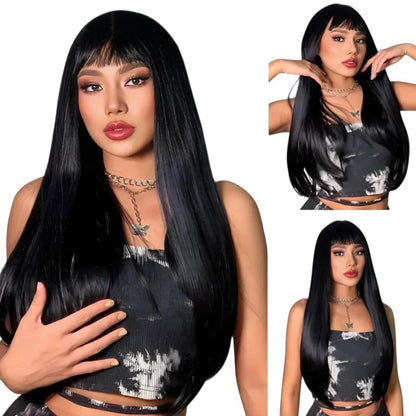RitzWigs natural black straight Remy human hair wig with bangs on a model wearing a black patterned top