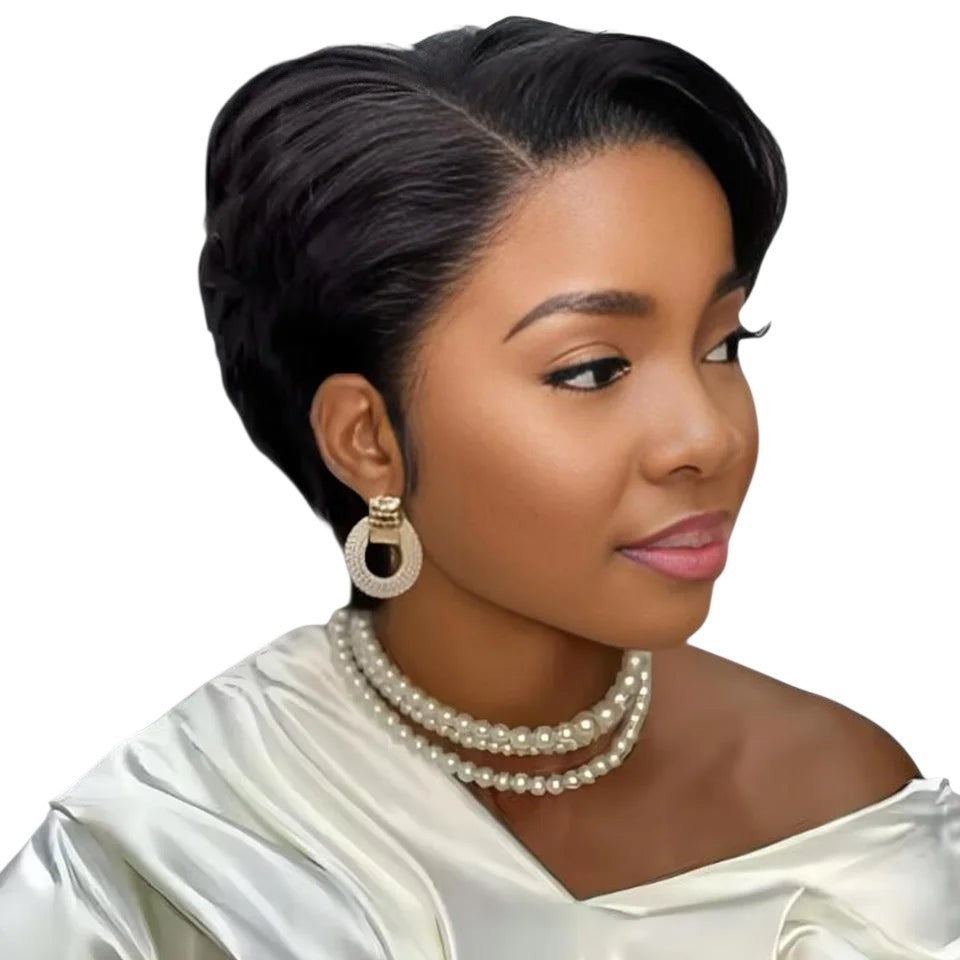 RitzWigs black straight pixie cut human hair wig with a side part on a woman wearing a white top and pearl necklace