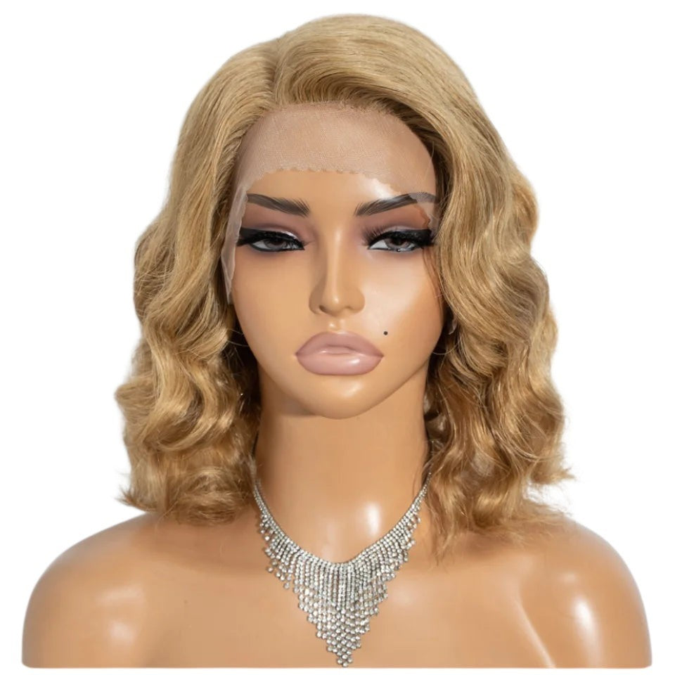 RitzWigs short blonde body wave bob lace front wig on a mannequin with a transparent lace base