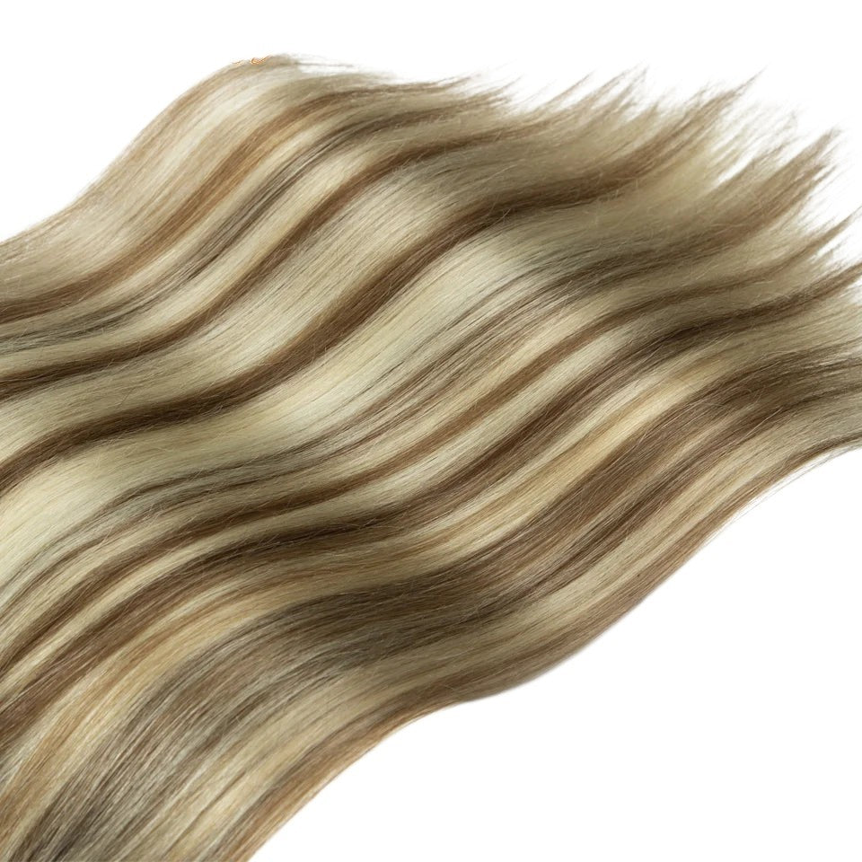 RitzWigs straight human hair clip-in extensions in a highlighted blonde and brown P6/613 colour blend