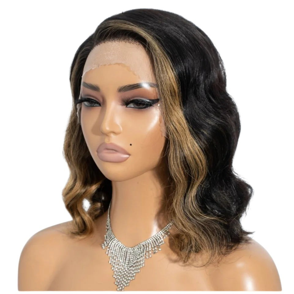 RitzWigs short body wave bob wig with blonde skunk stripe highlights on a mannequin wearing a silver necklace.
