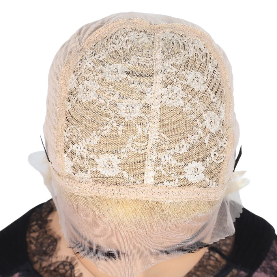 RitzWigs blonde human hair lace front wig cap interior showing Swiss lace construction and adjustable straps