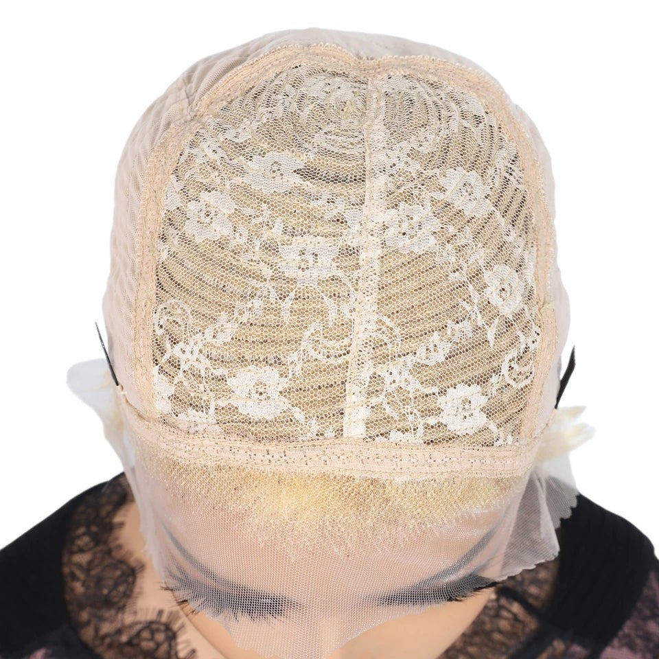 RitzWigs blonde human hair lace front wig cap interior showing Swiss lace construction and adjustable straps
