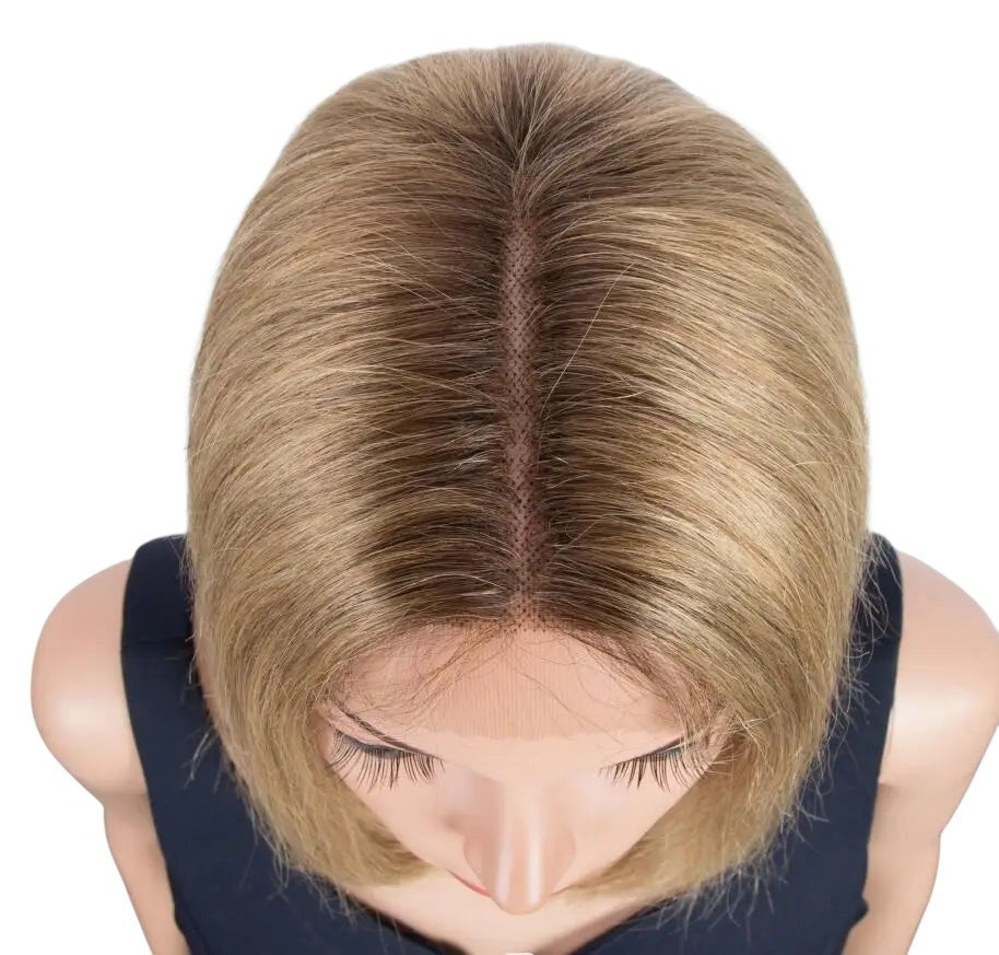 RitzWigs blonde ombre straight bob human hair wig with a 13x5x1 transparent lace part on a mannequin head