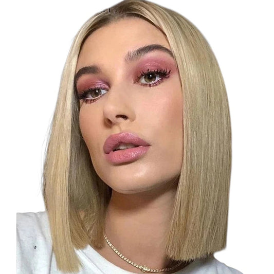 RitzWigs blonde straight bob lace front wig on a woman with pink eyeshadow