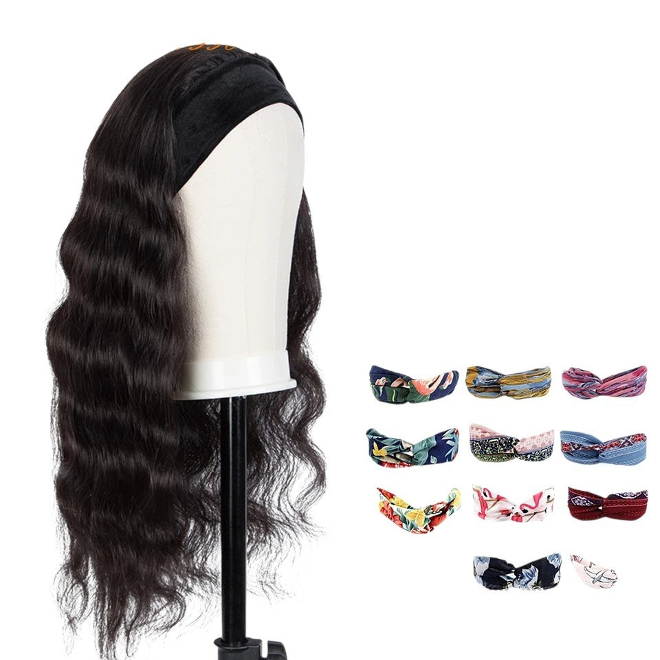 RitzWigs 28-inch body wave headband wig made of natural black Remy Brazilian human hair on a mannequin head
