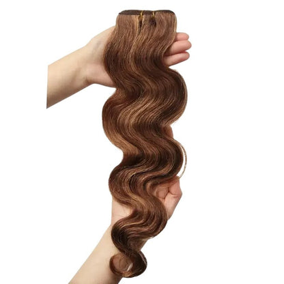 RitzWigs body wave human hair bundle in P6/27 brown and blonde highlight colour held in hand