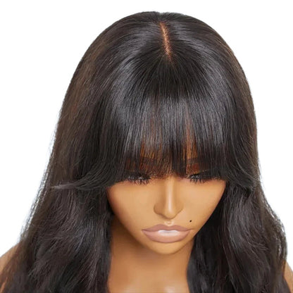 RitzWigs 24-inch body wave human hair wig with bangs and a middle part, featuring natural dark brown Remy hair.