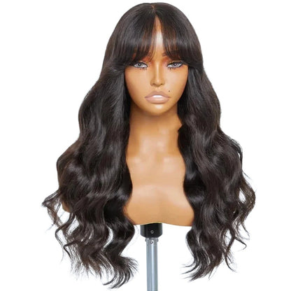 RitzWigs 24-inch body wave human hair wig with bangs and middle part in natural dark colour on a mannequin head