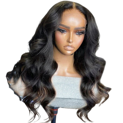 RitzWigs Brazilian body wave human hair wig with pre-plucked hairline and transparent lace front on a mannequin head.