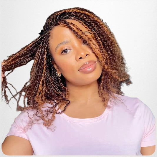 RitzWigs Brazilian human hair bundle styled in brown and blonde kinky twists on a woman