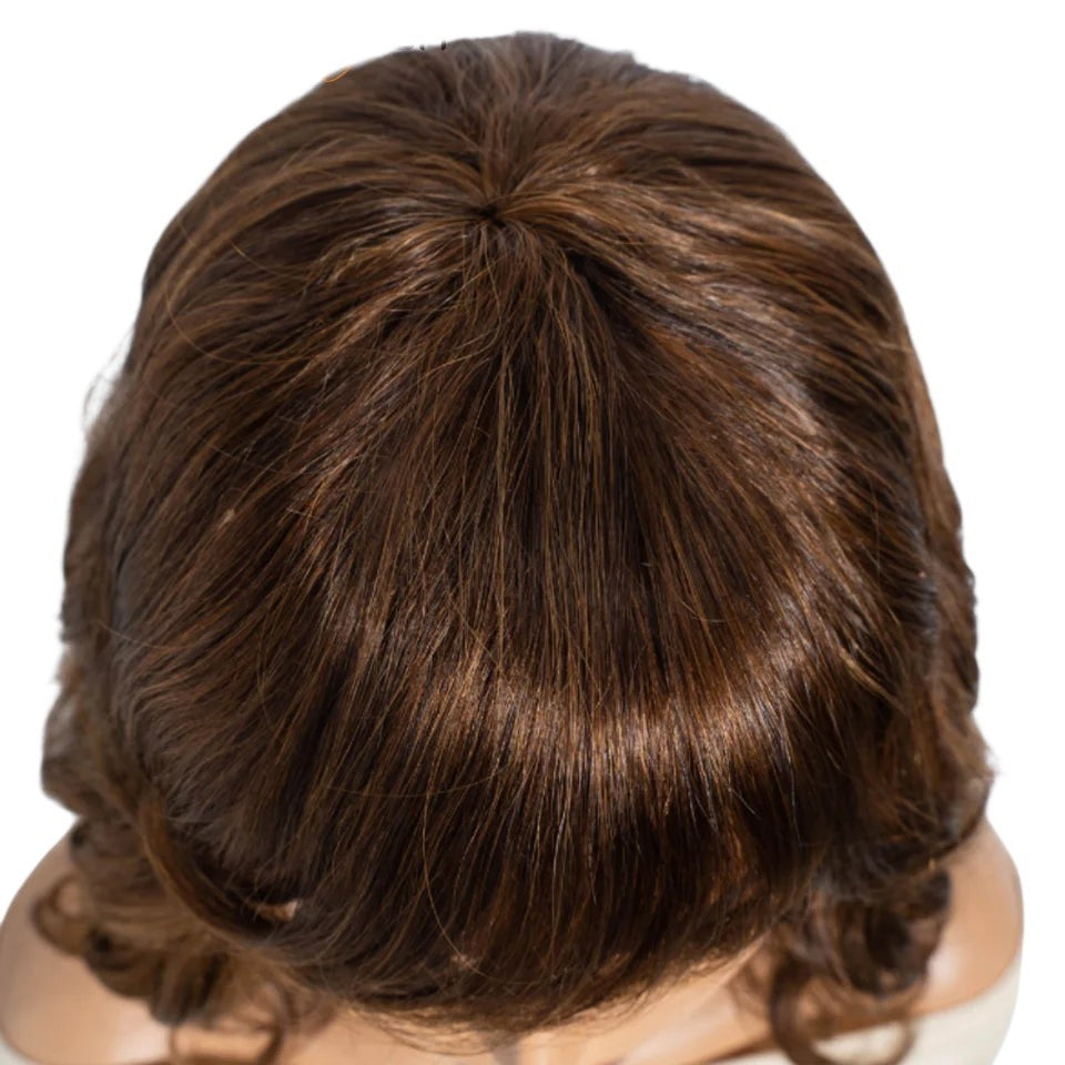 Top view of a RitzWigs short brown body wave human hair bob wig with natural scalp detail