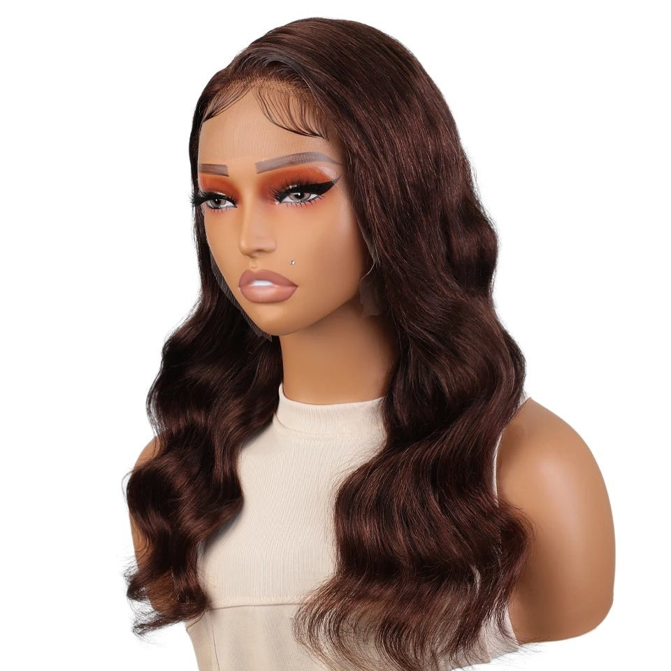 RitzWigs natural brown body wave human hair lace frontal wig on a mannequin head with pre-plucked HD lace hairline.