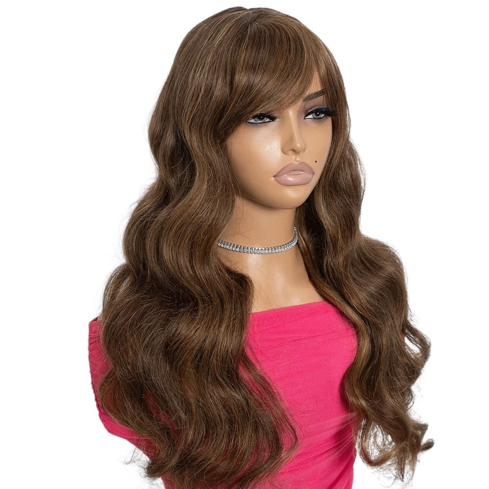 RitzWigs natural brown body wave human hair wig with bangs on a mannequin wearing a pink top