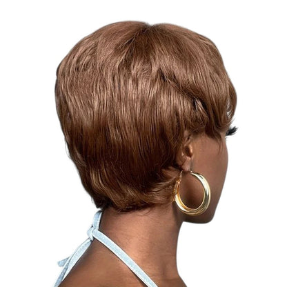 RitzWigs brown pixie cut straight human hair wig with short layers seen from the back on a woman wearing gold hoops
