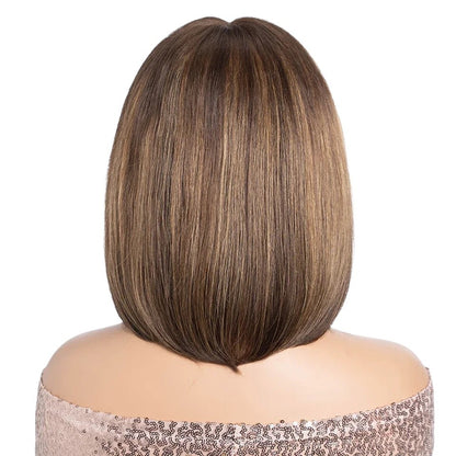 RitzWigs brown straight human hair bob wig with fringe, back view showing sleek texture and natural highlights