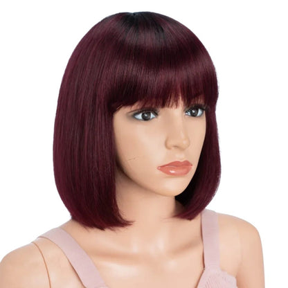 RitzWigs short straight bob human hair wig in 99J burgundy ombre with bangs on a mannequin head