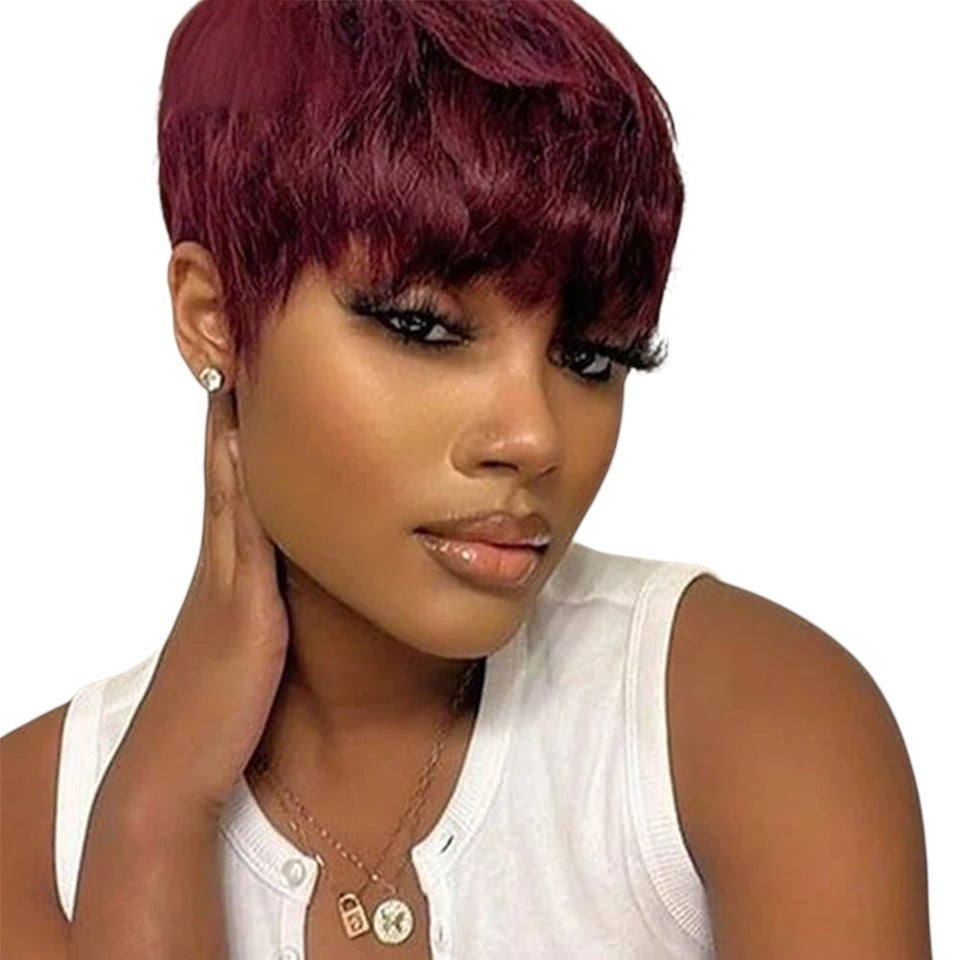 RitzWigs burgundy red short pixie cut straight human hair wig with bangs worn by a woman