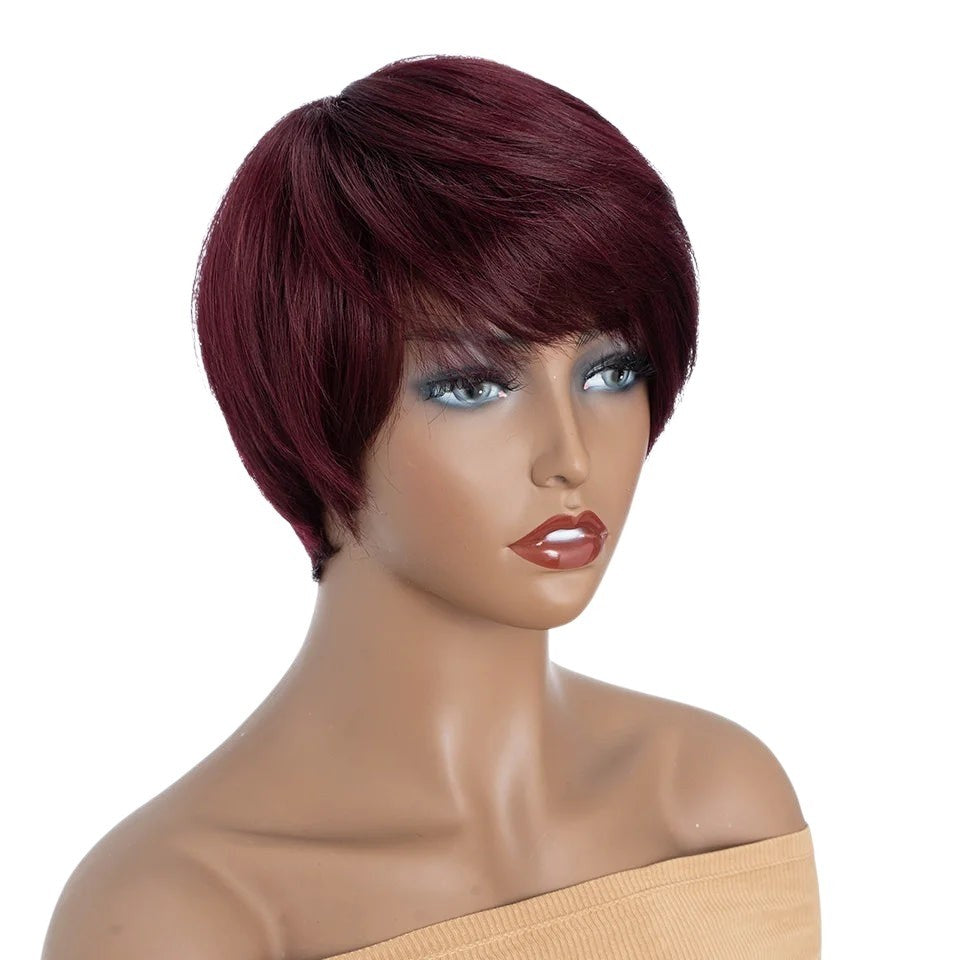 RitzWigs short straight burgundy human hair wig with bangs on a mannequin head