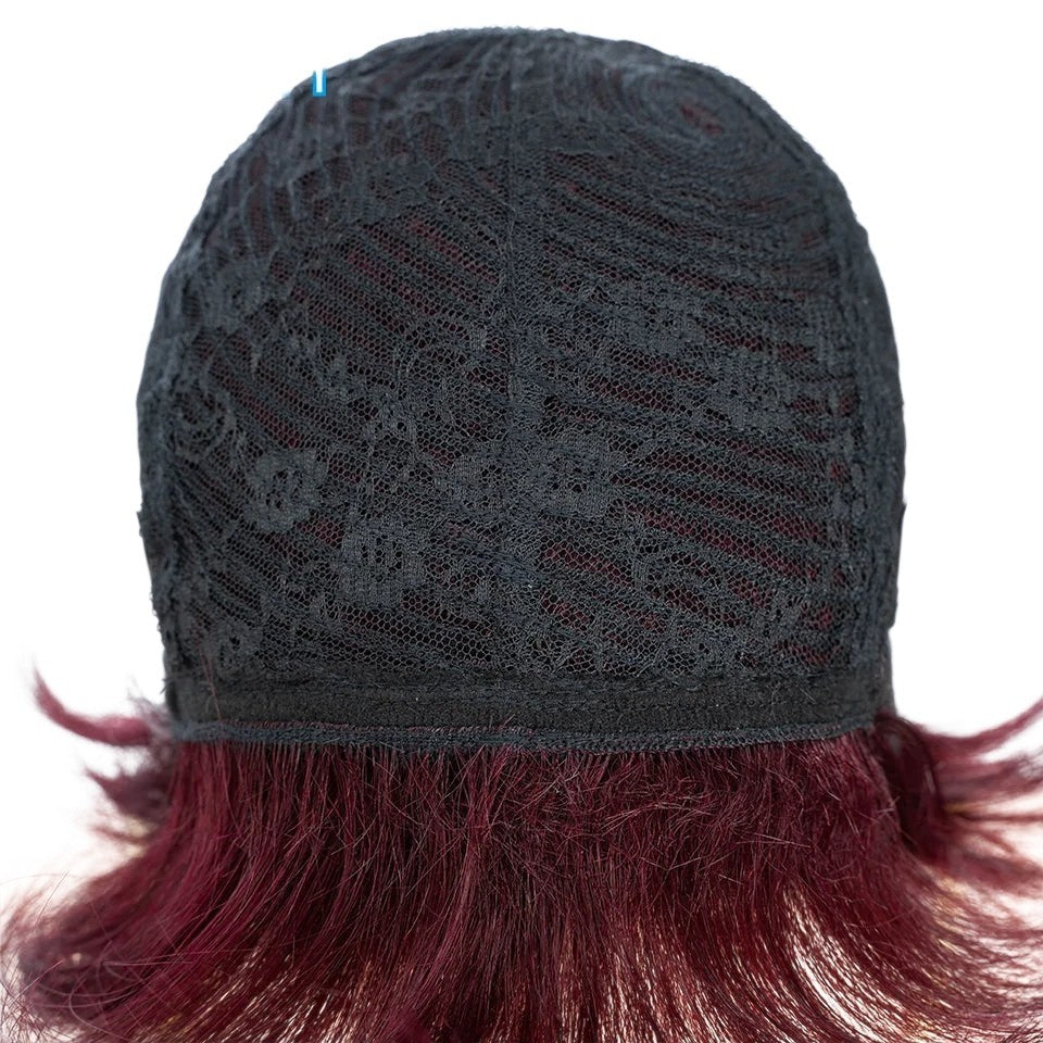 RitzWigs burgundy red short straight human hair wig showing the interior black lace cap construction