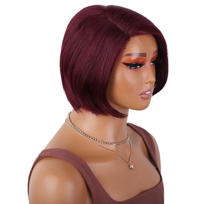 RitzWigs burgundy short straight bob human hair wig with a side part on a mannequin head
