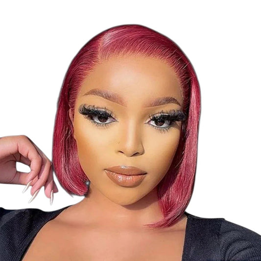 RitzWigs burgundy straight human hair bob wig with a side part worn by a model with natural makeup.