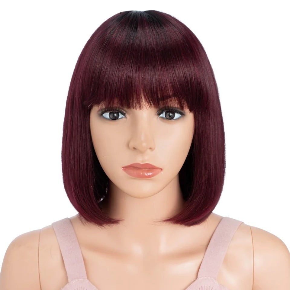 RitzWigs short straight 99J burgundy bob wig with bangs made of Brazilian human hair on a mannequin