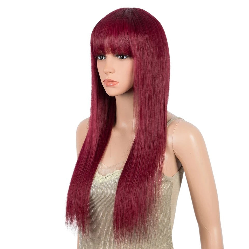 RitzWigs burgundy straight human hair wig with bangs on a mannequin