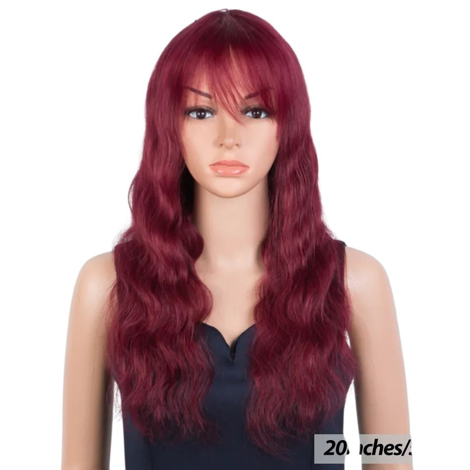 RitzWigs burgundy red wavy human hair wig with bangs on a mannequin, 20-inch length, Remy Peruvian hair style.