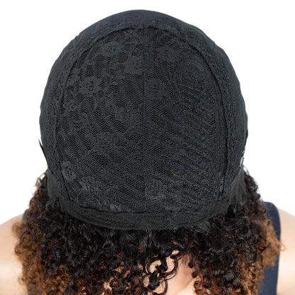 RitzWigs glueless Brazilian human hair wig cap showing the interior lace construction and curly ombre hair texture
