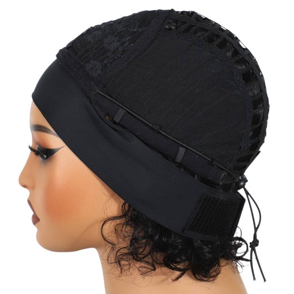 RitzWigs natural black curly pixie cut headband wig on a mannequin head showing the adjustable glueless cap design