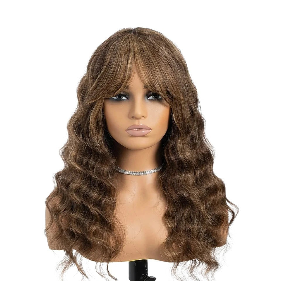 RitzWigs deep wave human hair wig with bangs in a natural brown highlighted shade on a mannequin head