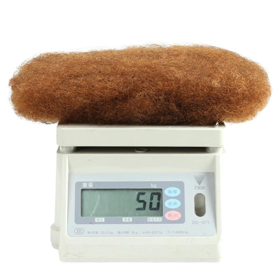 RitzWigs ginger afro kinky bulk human hair bundle weighing 50g on a digital scale for braiding and twists