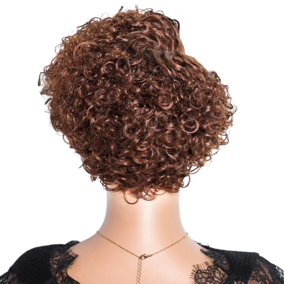RitzWigs ginger curly short bob pixie cut human hair wig on a mannequin, back view showing deep wave texture.