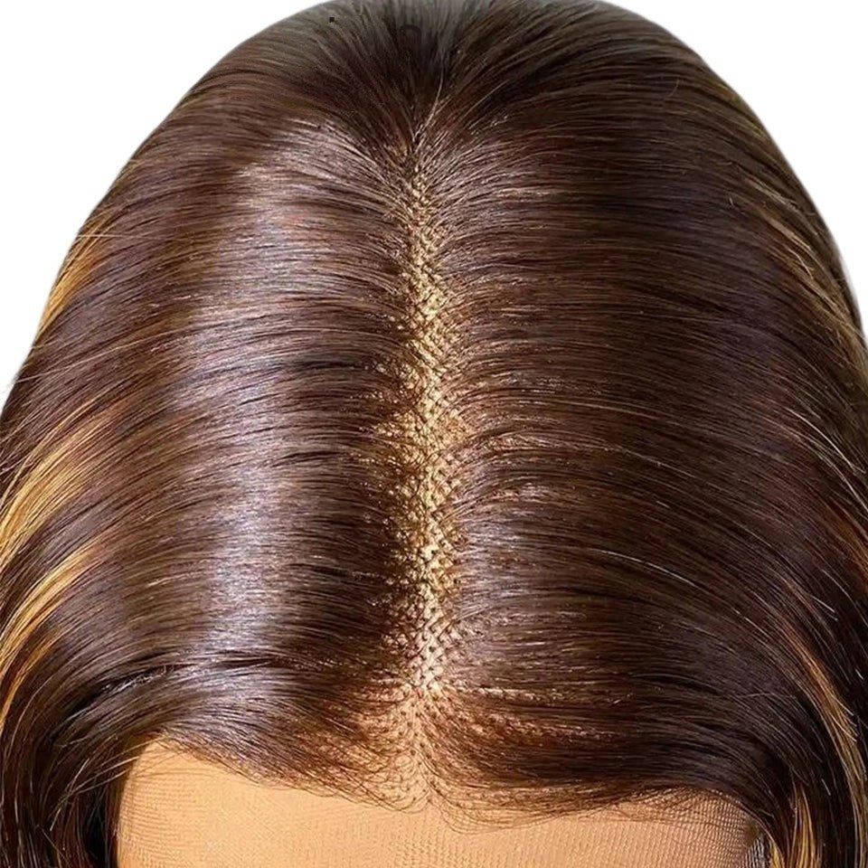 RitzWigs straight human hair wig with ginger orange highlights and a natural transparent lace middle part