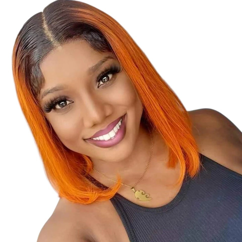 RitzWigs straight ginger ombre bob human hair wig with dark roots and transparent lace front on a smiling woman