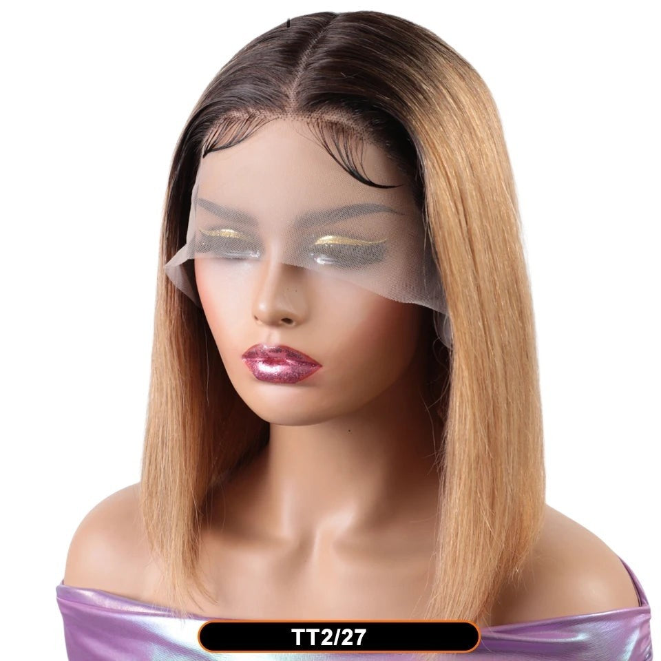 RitzWigs straight bob human hair wig with dark roots and ginger ombre on a mannequin head with transparent lace front