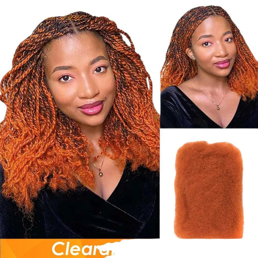 RitzWigs ginger orange afro kinky bulk human hair extensions worn as twists by a model with a natural textured style