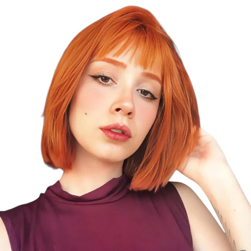 RitzWigs ginger orange straight short bob human hair wig with bangs worn by a model