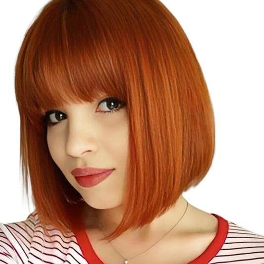 RitzWigs ginger orange straight short bob human hair wig with bangs worn by a woman