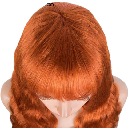 RitzWigs ginger orange body wave human hair wig with bangs on a mannequin head, top view showing natural texture.