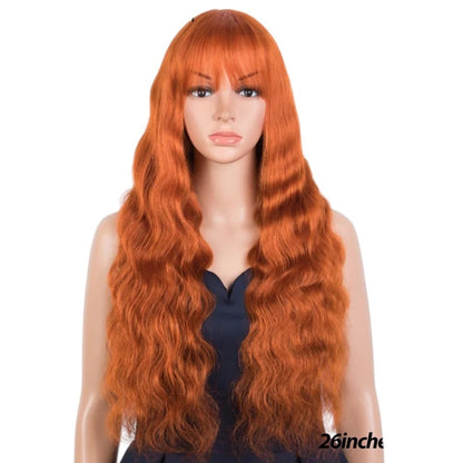 RitzWigs ginger orange wavy human hair wig with bangs on a mannequin head
