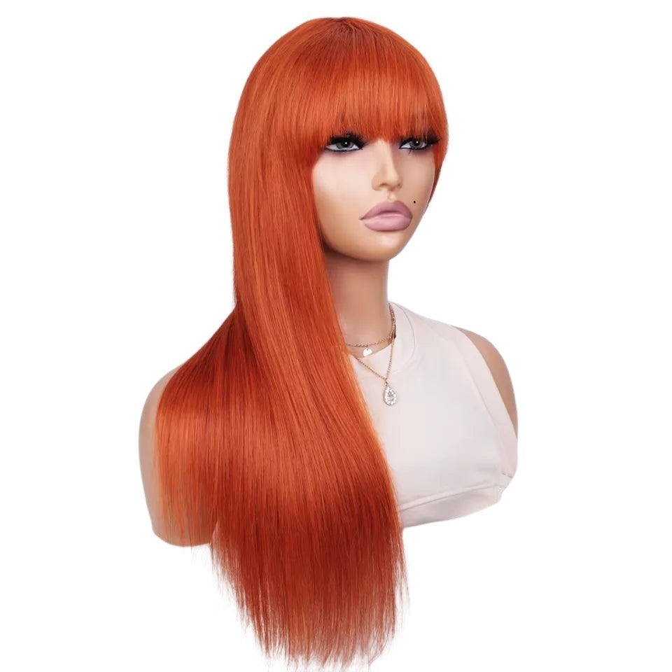 RitzWigs ginger long straight human hair wig with bangs on a mannequin head