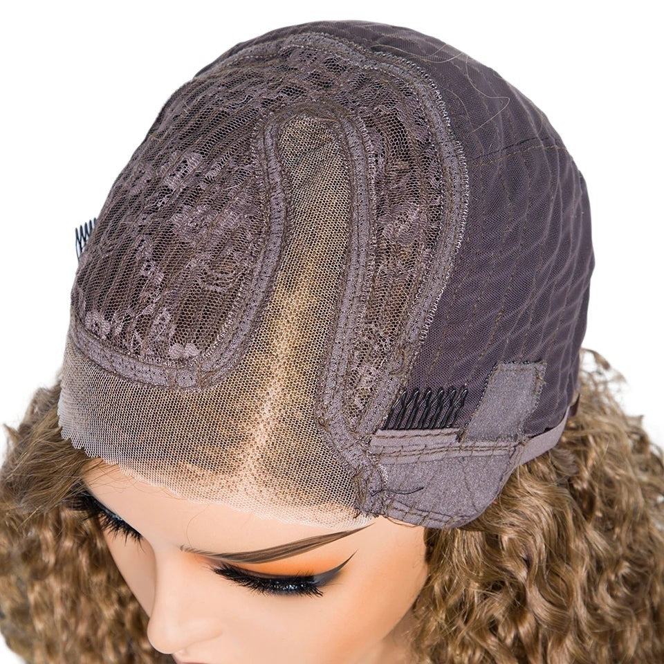 RitzWigs glueless curly bob wig showing the interior 6x1 transparent Swiss lace cap construction on a mannequin head
